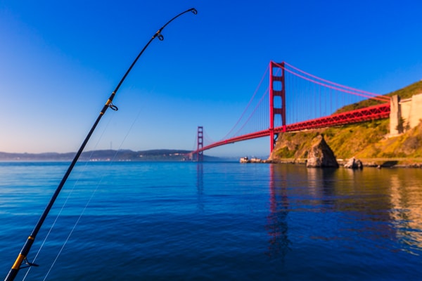 Beautiful day for fishing on San Francisco bay with Golden Gate Bridge